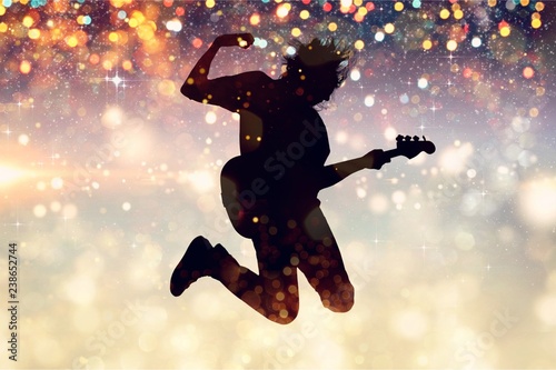 Cuadros en Lienzo Portrait of a Musician Jumping while Playing