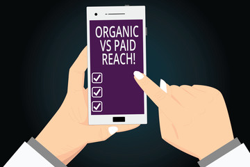 Wall Mural - Writing note showing Organic Vs Paid Reach. Business photo showcasing Increasing followers naturally or by paying for it Hu analysis Hands Holding Pointing Smartphone Blank Color Screen