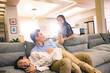© View Stock - Happy family in the living room