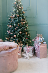 image of chimney and decorated christmas tree with gift. christmas interior.