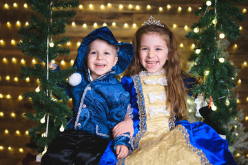 Poster - laughing kids in blue festive suits