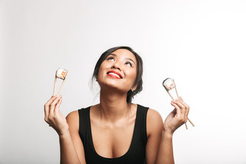 Poster - Pretty happy asian woman sitting isolated