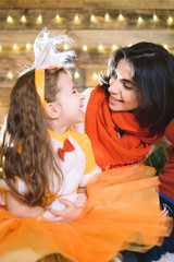 Poster - smiling mother and daughter looking at each other