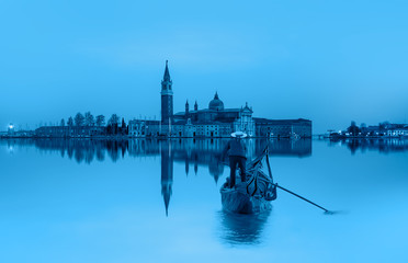 Panoramic aerial view at San Giorgio Maggiore island with gondola, Venice, Italy 