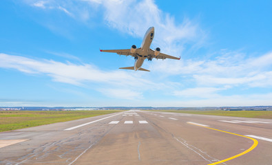 Wall Mural - Airplane take off from the airport - Travel by air transport 