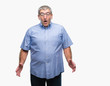 © Krakenimages.com - Handsome senior man wearing glasses over isolated background afraid and shocked with surprise expression, fear and excited face.