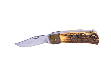 Isolated image of an old sharp folding metal knife with antler handle on white background