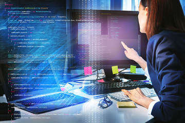 Business woman working with computer in the office