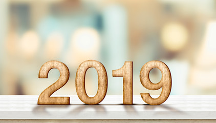 Poster - Happy new year 2019 on marble table with pale soft bokeh wall,banner for display or montage of product for holiday promotion and advertise for online content