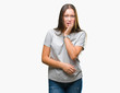 © Krakenimages.com - Young caucasian beautiful woman over isolated background looking stressed and nervous with hands on mouth biting nails. Anxiety problem.