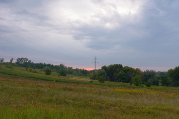 Rural landscape with field and blue sky