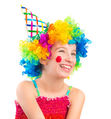 Wall Mural - Funny little girl in clown wig with red spots on her cheeks isolated on white background