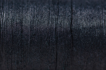 Black thread macro background clothing sewing material