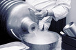 Chef is pouring liquid nitrogen from a large Dewar flask, toned