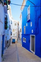 Blue and white houses in historical district of Chelva, Valencian Community, Spain