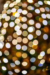 Poster - Christmas home room with tree and festive bokeh lighting, blurred holiday background