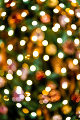 Poster - Christmas home room with tree and festive bokeh lighting, blurred holiday background