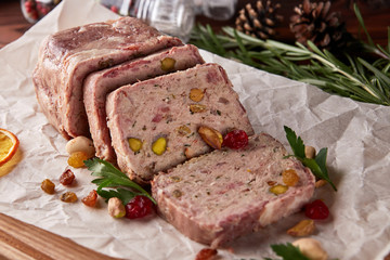 Terrine of ground meat, ham, raisins, pistachios