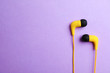 © New Africa - Stylish headphones on color background, top view. Space for text
