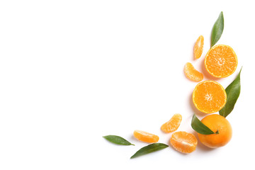 Composition with tangerines and leaves on white background, top view. Space for text