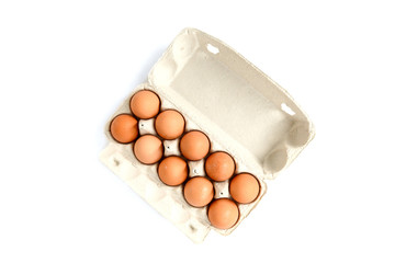 Wall Mural - Eggs in pack isolated on white background