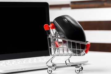 Shopping Cart and Computer Mouse, concept of online shopping