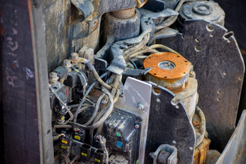 Close up open electric forklift. Corrosion build up on parts.