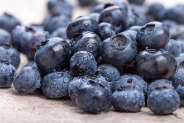 fresh picked lueberries on wooden background