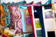 Row Of Colorful Hand-made Pillows