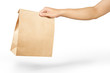 © runrun2 - Right hand holidng a brown paper bag isolated on white with clipping path.