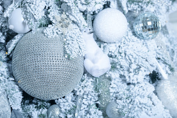 Christmas balls on fir tree. New Year holidays and Christmastime celebration.