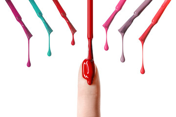 Wall Mural - messy drop of red nail polish dripping  on nail isolated on white