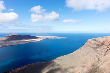 Wall Mural - Volcanic Island La Graciosa. View from Lanzarote, Canary Islands