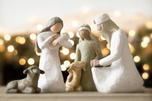 Christmas Photograph Of A Nativity Set With Mary, A King And A Shepherd Gazing At Baby Jesus