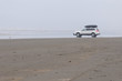 A white family car in Pacific beach area, Ocean Shores, WA
