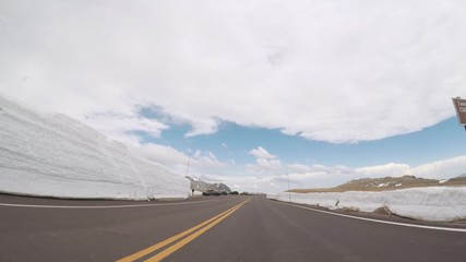 Autocollant - Driving on Trail Ridge Road on opening weekend of the season in Rocky Mountain National Park.