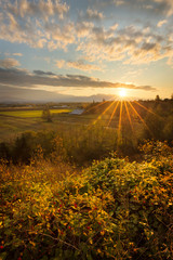 Sun rays warming the fields during autumn in the sequim valley, washington state