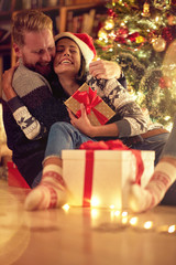 Wall Mural - love, happiness for Christmas, concept- smiling couple in love at Christmas .