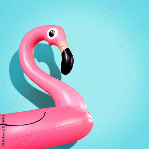 Cuadros en Lienzo Giant inflatable Flamingo on a blue background, pool float party, trendy summer