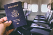 American passport in an airplane