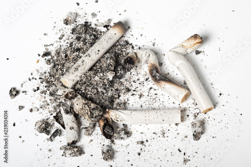 Fényképezés A close-up of cigarette burns at the white background