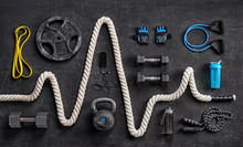Sports Equipment On A Black Background. Top View. Motivation