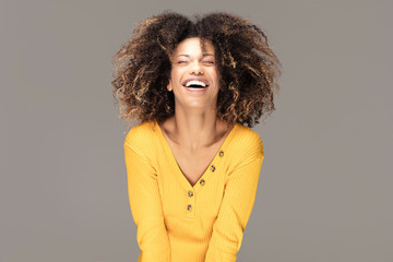 Wall Mural - Happy african american woman smiling.