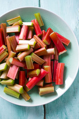 Poster - pieces of rhubarb on turquoise wooden surface