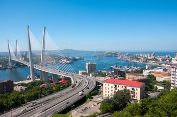 Wall Mural - Russia, Vladivostok, July 2018: View of Golden Bridge over Golden Horn Bay of Vladivostok