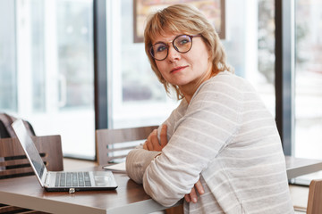 Wall Mural - woman in cafe, office