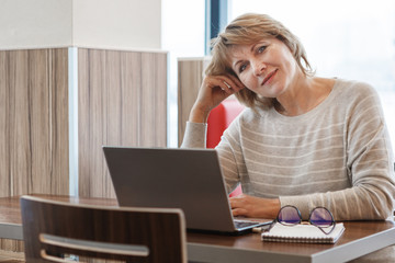 Wall Mural - woman in cafe, office