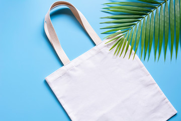 White tote bag canvas fabric. Cloth shopping sack mockup with copy space.