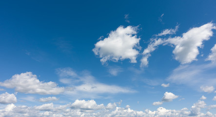 Wall Mural - Beautiful background of blue sky and white clouds.