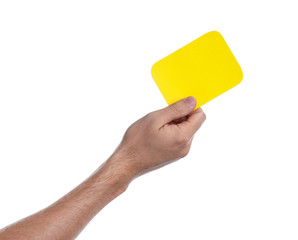 Man holding yellow card on white background, closeup of hand